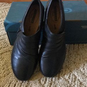 Clark’s black slip on shoes